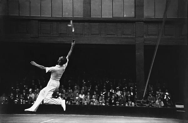 Fred Perry competing at Wimbledon Number One Court, on the first day of the 1933