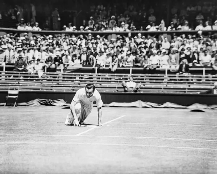 Framed Print : Fred Perry falls yet smiles on the court at The Wimbledon Mens Tennis Championships 1935 Framed Print : Fred Perry falls yet smiles on the court at The Wimbledon Mens Tennis Championships 1935