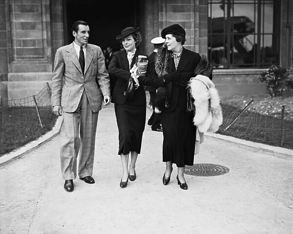 Fred Perry (Great Britain Tennis Player) and his wife Helen Vinson (centre)