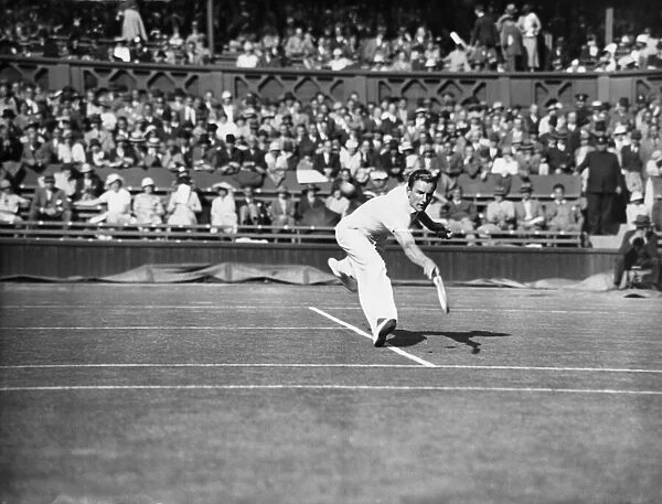 Fred Perry plays a back hand pass on The Centre Court at The Mens Wimbledon Tennis