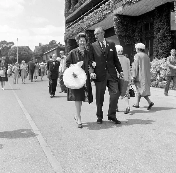 Fred Perry with his wife Barbara Riese at Wimbledon Tennis Championships