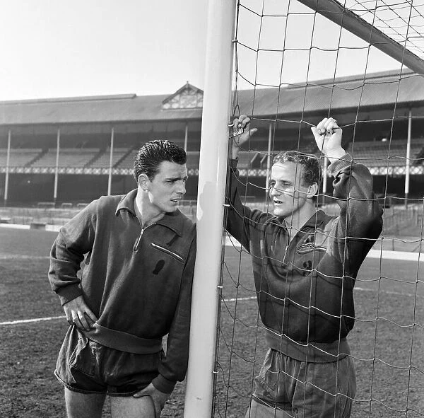 Fred Pickering and Alex Young (right) in the goalmouth at Everton FC after training