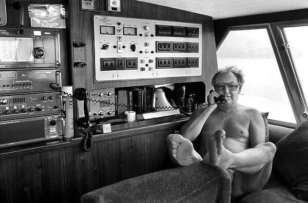Freddie Laker: Entrepreneur with his motor cruiser in Majorca. July 1981 81-03733a-032