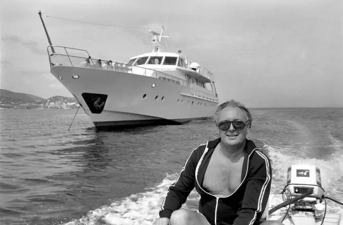 Framed Print : Freddie Laker: Entrepreneur with his motor cruiser in Majorca. July 1981 81-03733a-011