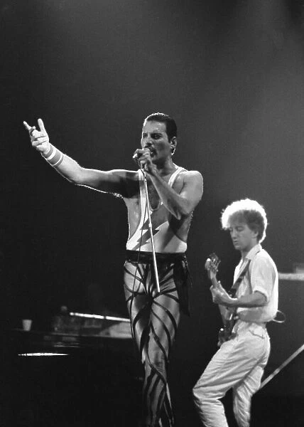 Freddie Mercury, lead singer of rock group Queen, delighted a packed audience