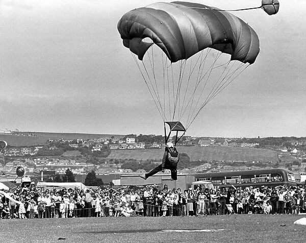One of the free-fall parachutes arrives safety - and on target- on Skelton Carnival field