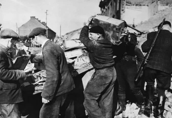 Framed Print : Free French Infantry carry off arms and ammunition from a knocked out German truck