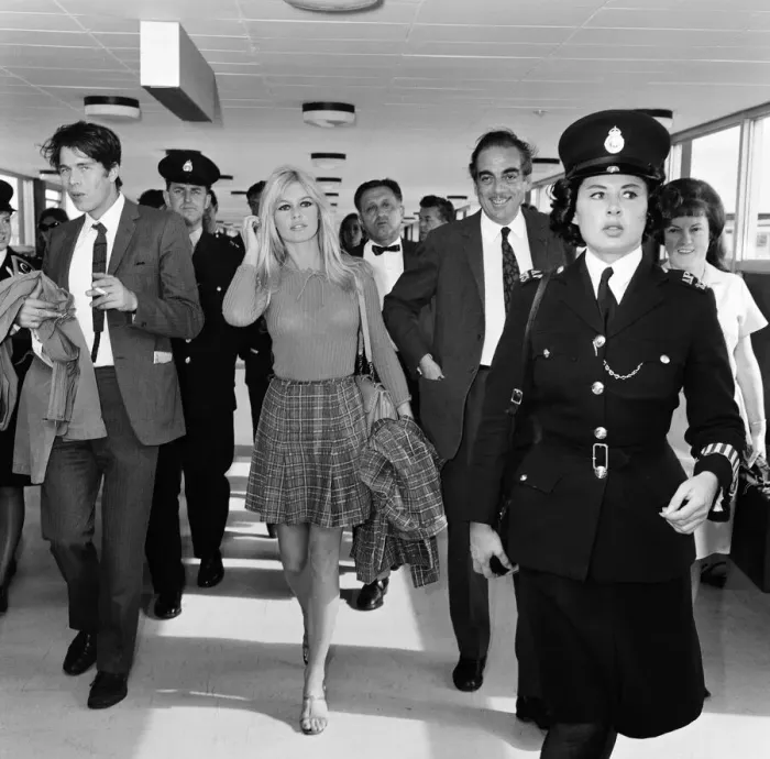 Framed Print : French actress Brigitte Bardot arrives at London airport as she visits England to film