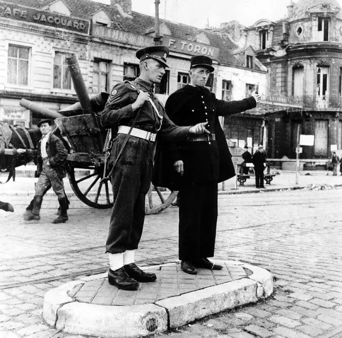 Framed Print : French policeman talks to an army soldier in the centre of Calais France Framed Print : French policeman talks to an army soldier in the centre of Calais France