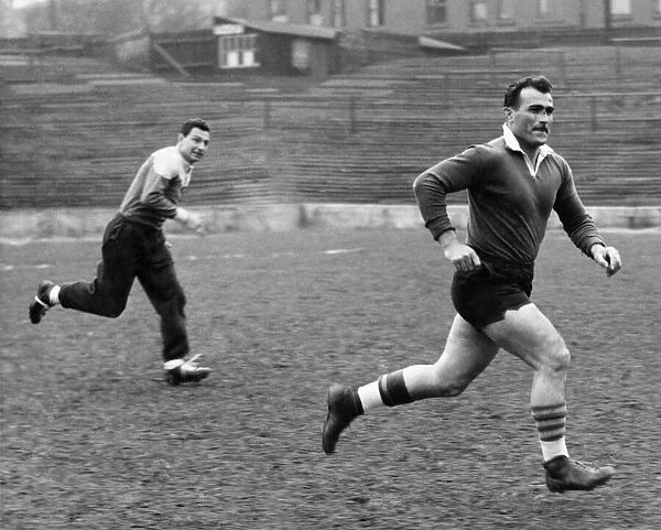 French Rugby players train at Swinton ground. Action of Rene Ferrero. (right)