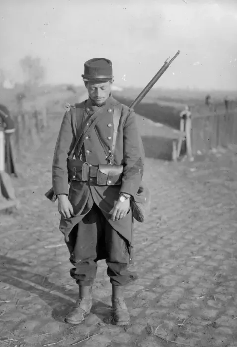 Framed Print : French soldier who has placed around his wrist his identification disc instead of his