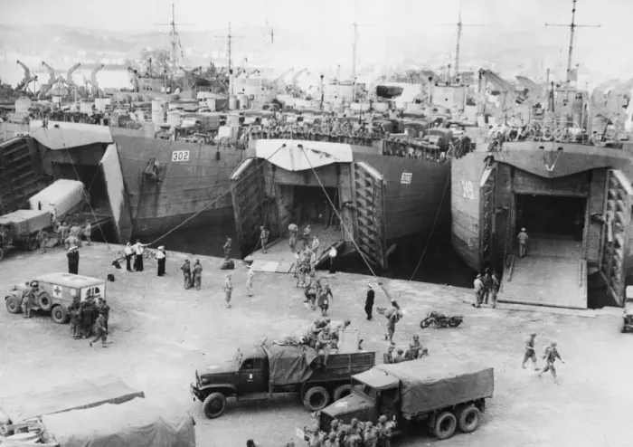 Framed Print : French vehicles and troops disembarking at an Italian port. 10th January 1944 Framed Print : French vehicles and troops disembarking at an Italian port. 10th January 1944