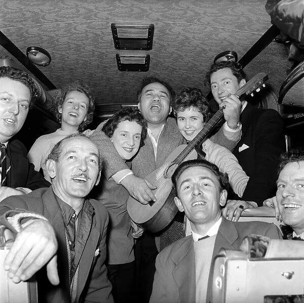 Friends enjoying a joke and a laugh on a coach trip to Manchester. July 1955 A322-003