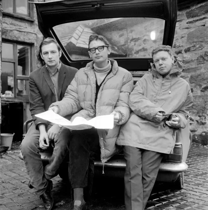 Framed Print : Three friends reading a map for an attempt to climb Mount Snowdonia in Wales Framed Print : Three friends reading a map for an attempt to climb Mount Snowdonia in Wales