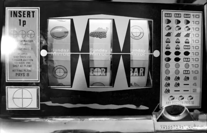 Framed Print : Fruit machines / Arcades / Amusements / Gambling. January 1975 75-00158-007 Framed Print : Fruit machines / Arcades / Amusements / Gambling. January 1975 75-00158-007