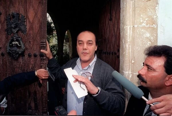 Fugitive businessman Asil Nadir speaks to the press at his home in Cyprus after he fled