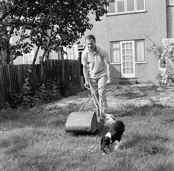Fulham and England footballer George Cohen tries his hand at some household chores at