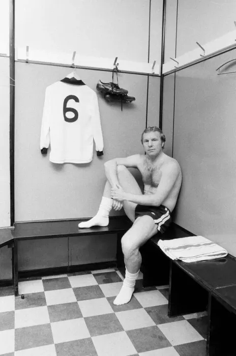 Framed Print : Fulham footballer Bobby Moore sits alone in the dressing room at Craven Cottage with his Framed Print : Fulham footballer Bobby Moore sits alone in the dressing room at Craven Cottage with his