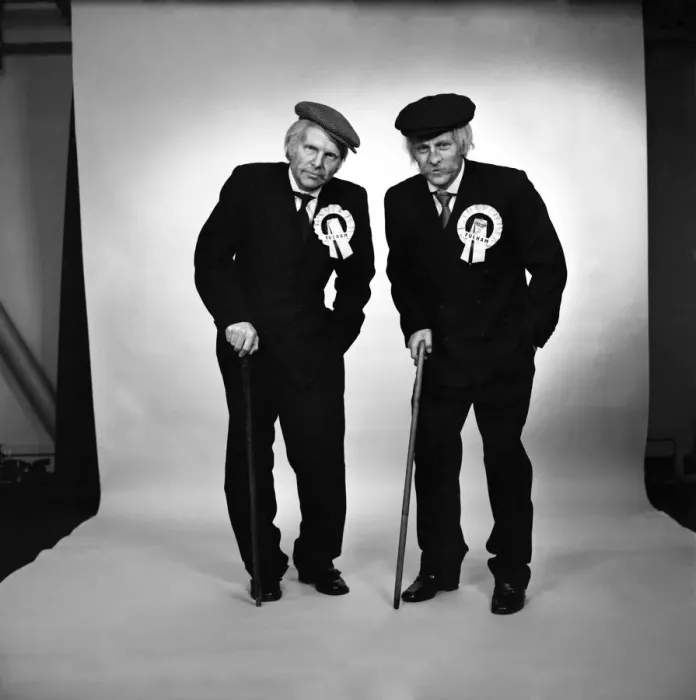 Framed Print : Fulham footballers Bobby Moore (left) and Alan Mullery dressed in suits and make-up Framed Print : Fulham footballers Bobby Moore (left) and Alan Mullery dressed in suits and make-up