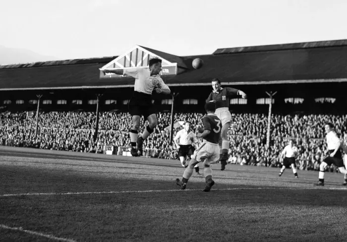 Framed Print : Fulham v. Leicester. Charlie Mitten of Fulham heads the ball. 3rd September 1952 Framed Print : Fulham v. Leicester. Charlie Mitten of Fulham heads the ball. 3rd September 1952