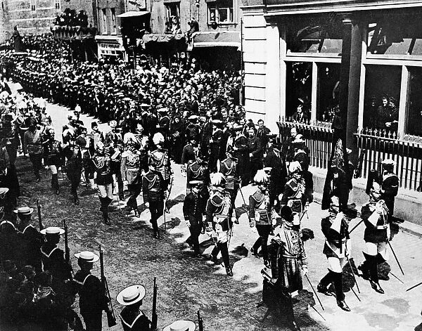 Funeral ceremony of King Edward VII in London showing crowds lined on the streets as