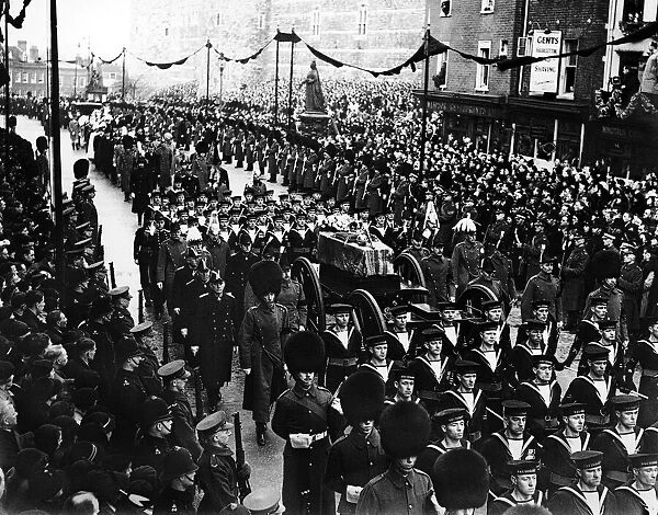 Funeral ceremony of King George V in London showing crowds lined on the streets as