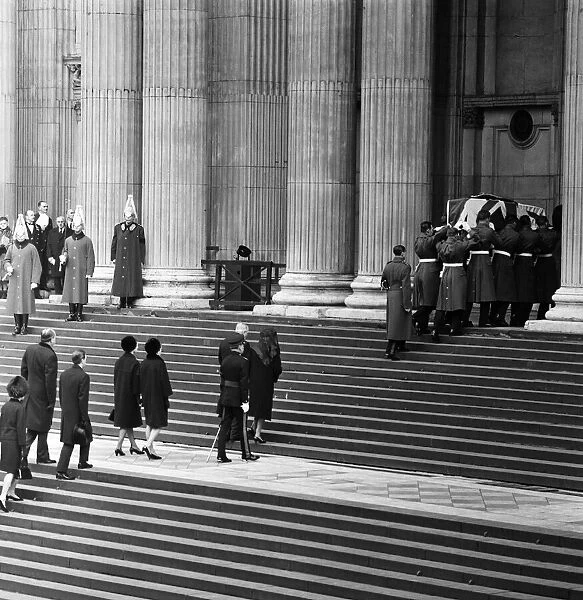 The funeral of Sir Winston Churchill. Pictured, the coffin is carried into St Paul