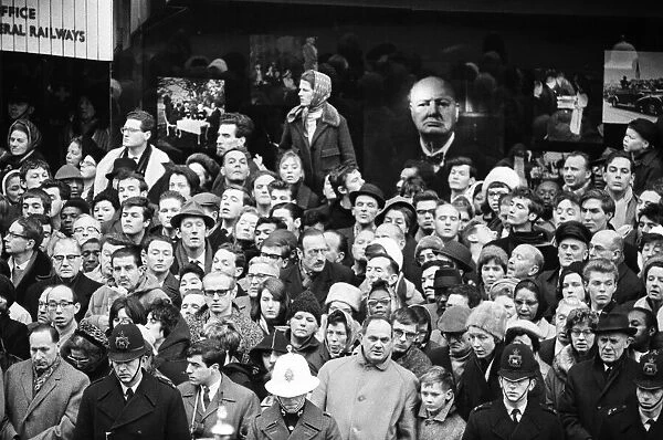 The funeral of Sir Winston Churchill. The sad faces of the crowd as the funeral passes