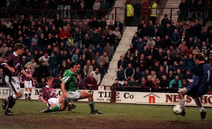 Framed Print : Gary MacKay Hearts football player scores goal past Hibs keeper Jim Leighton