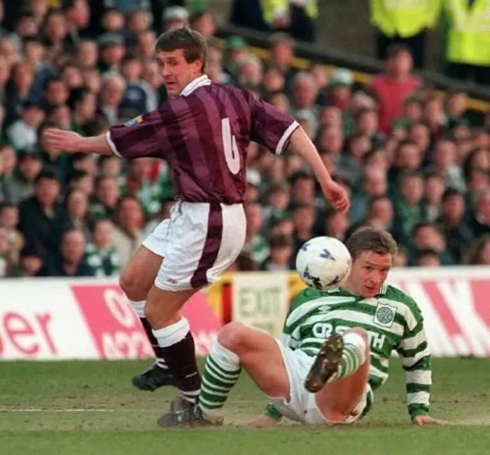 : Gary Mackay tackled by Peter Grant Celtic against Hearts Scottish premier league match : Gary Mackay tackled by Peter Grant Celtic against Hearts Scottish premier league match