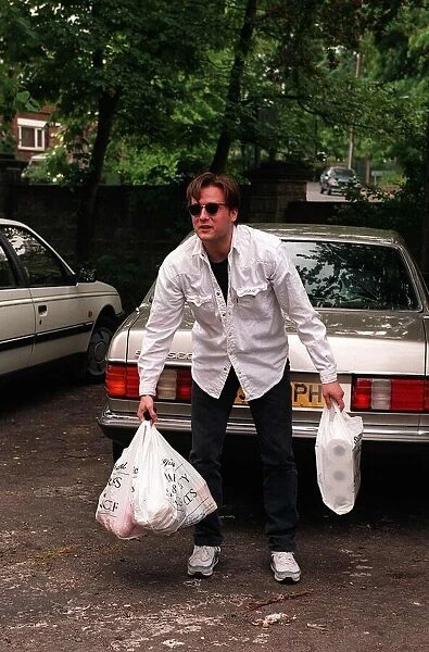 Gary Webster Actor Minder arrives at his south London home following a shopping trip he