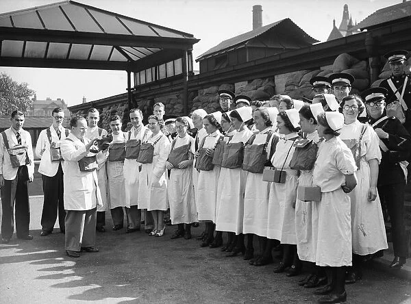 A gas mask lesson at Birmingham Hospital for the doctors, nurses and ambulance men