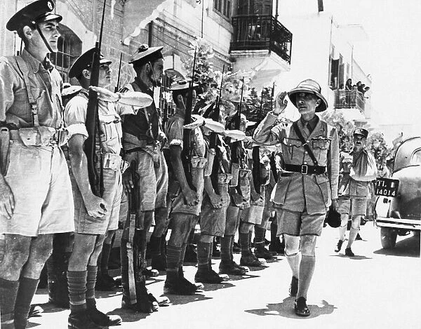 Gen. Catroux and Gen. Le Gentilhomme (in rear) inspecting a guard of honour on arrival at