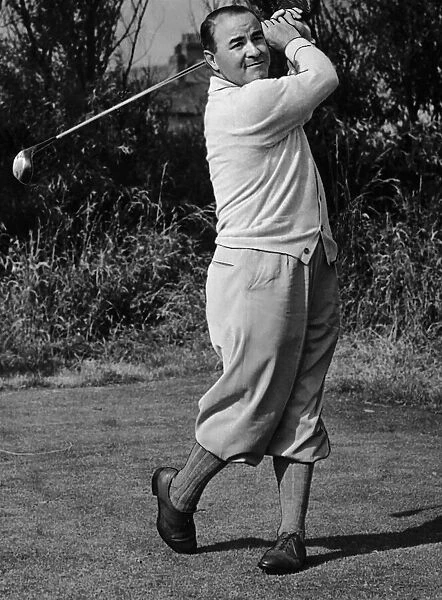 Gene Farayer golfer playing golf shot from tee swing wood club