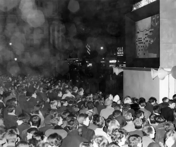 Framed Print : General Election 1966: Crowds in Trafalgar Square, London watching the election results