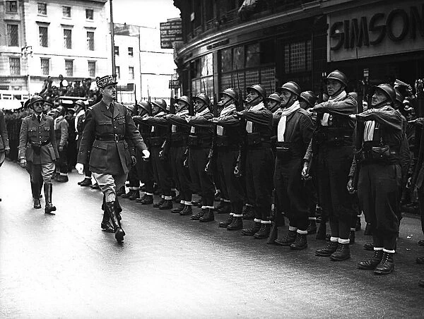 General de Gaulle reviews French troops in London, 1940 Soldier and statesman