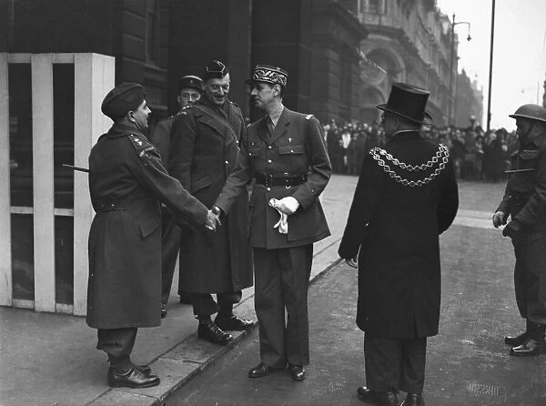 General de Gaulle shakes the hand of a Home Guard officer, Lt-Col. John H. Lewis