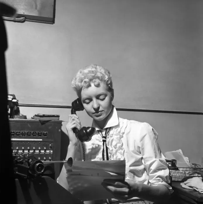 Framed Print : General office scene: Secretary taking notes and answering the phone in a Birmingham Framed Print : General office scene: Secretary taking notes and answering the phone in a Birmingham