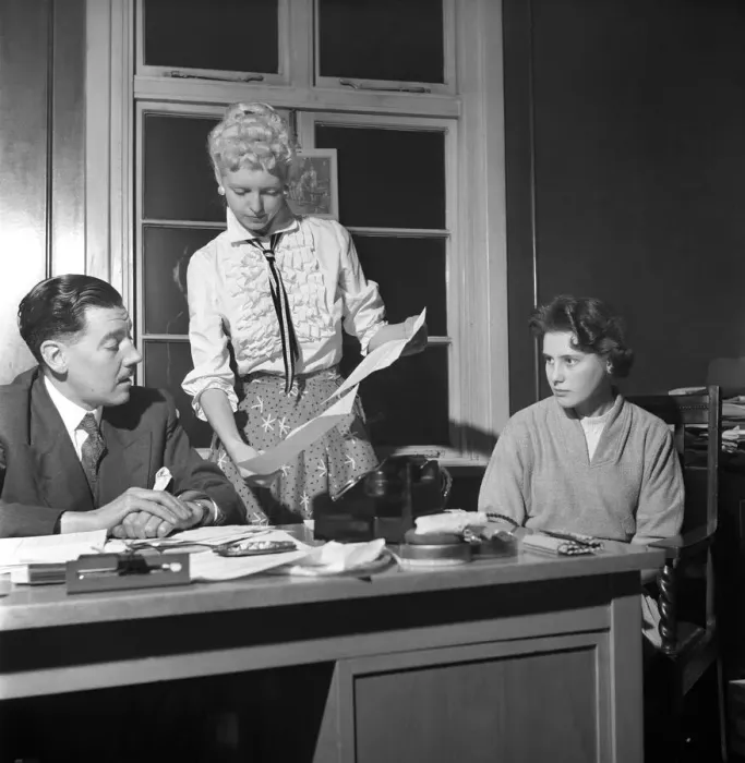 Framed Print : General office scene: Secretary taking notes and answering the phone in a Birmingham Framed Print : General office scene: Secretary taking notes and answering the phone in a Birmingham