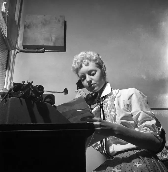 Framed Print : General office scene: Secretary taking notes and answering the phone in a Birmingham