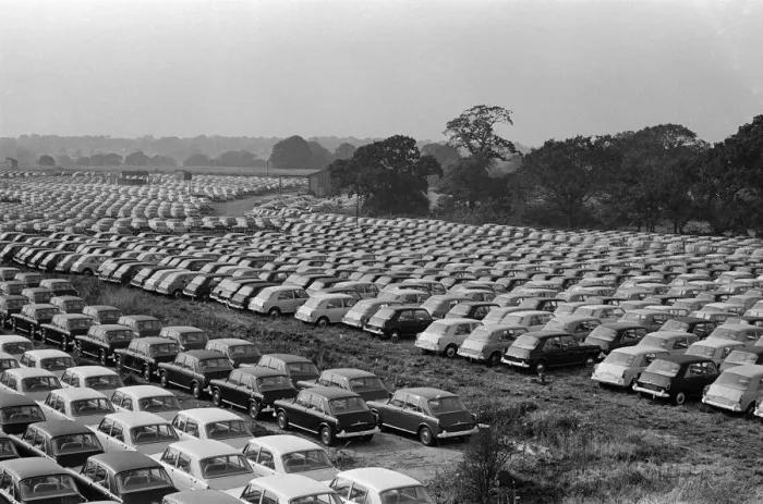 Framed Print : General scenes showing cars parked outside the BMC factory in Longbridge