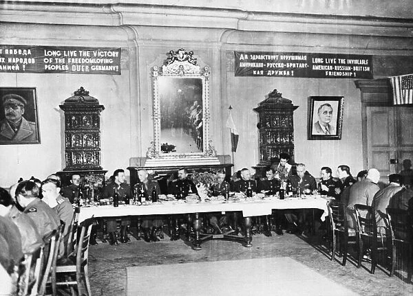 General view of banquet hall, decorated by banners and pictures of Stalin and Roosevelt