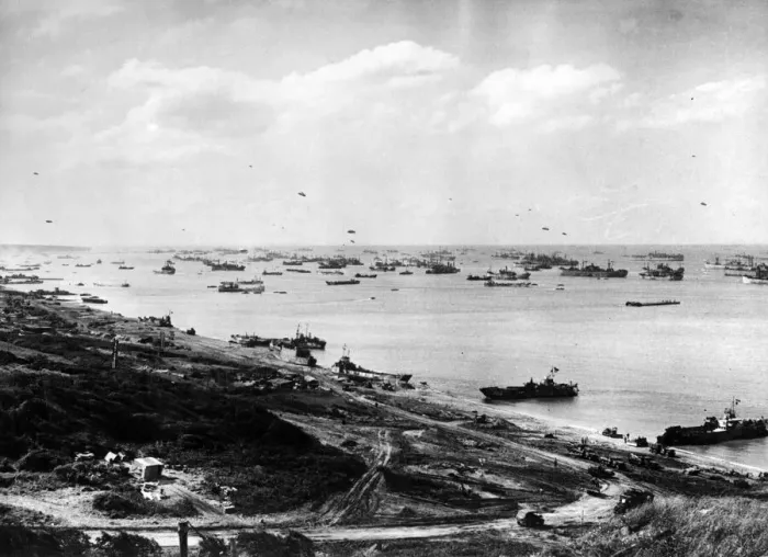 Framed Print : A general view of a beach in France, three weeks after D-Day showing the constant flow of