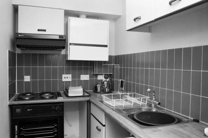Framed Print : General view of a kitchen in a flat. 29th October 1986
