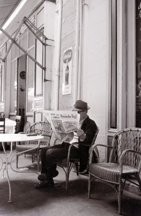 Framed Print : A gentleman reads the paper in a Marsaille street cafe Framed Print : A gentleman reads the paper in a Marsaille street cafe