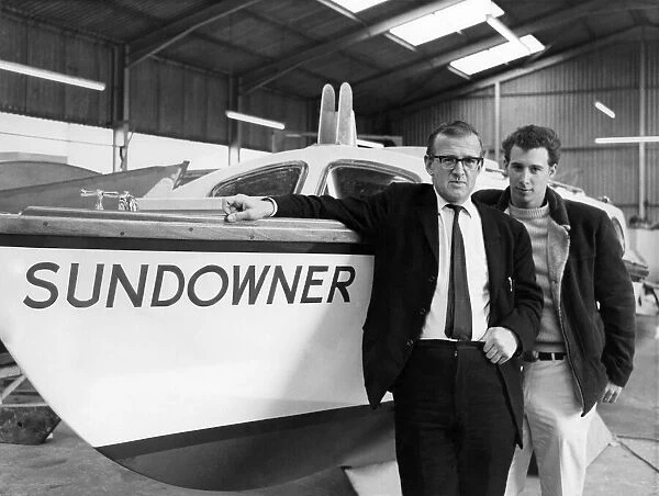 Geoff Godwin and Larry Rodney with the boat 'Sundowner'