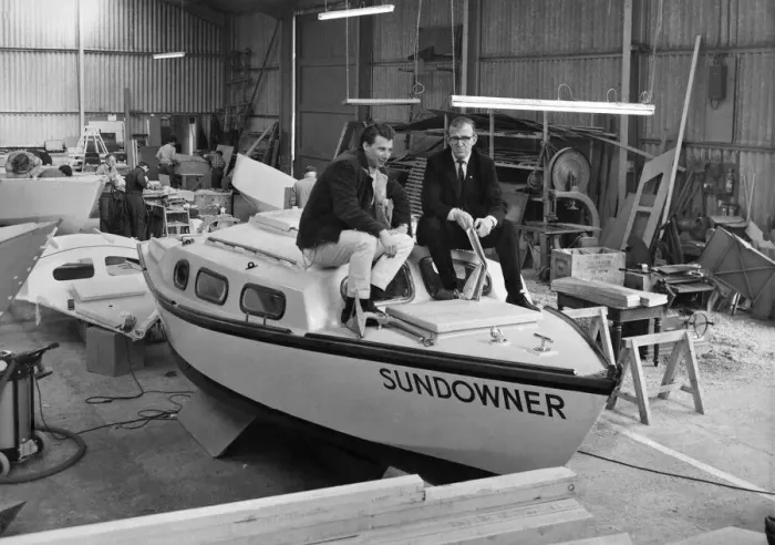 Framed Print : Geoff Godwin and Larry Rodney with the boat Sundowner Framed Print : Geoff Godwin and Larry Rodney with the boat Sundowner