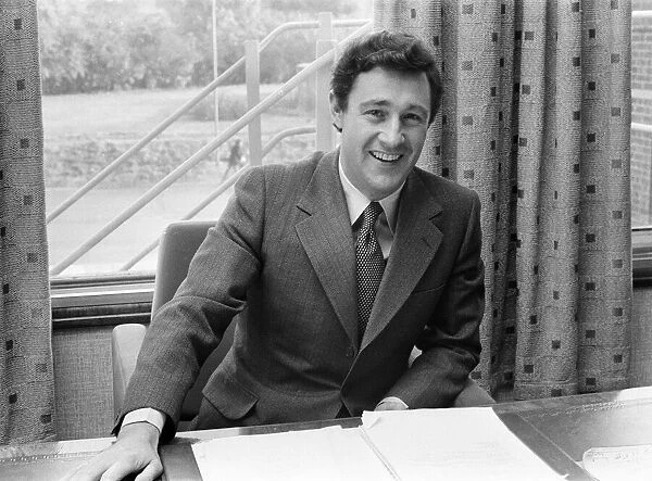 Geoffrey Robinson, Managing Director Jaguar Cars, pictured at his desk, Coventry