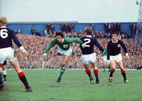 George Best in action for Northern Ireland against Scotland during the International