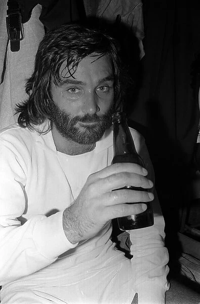 George Best drinking beer after playing Dunstable Town FC August 1974